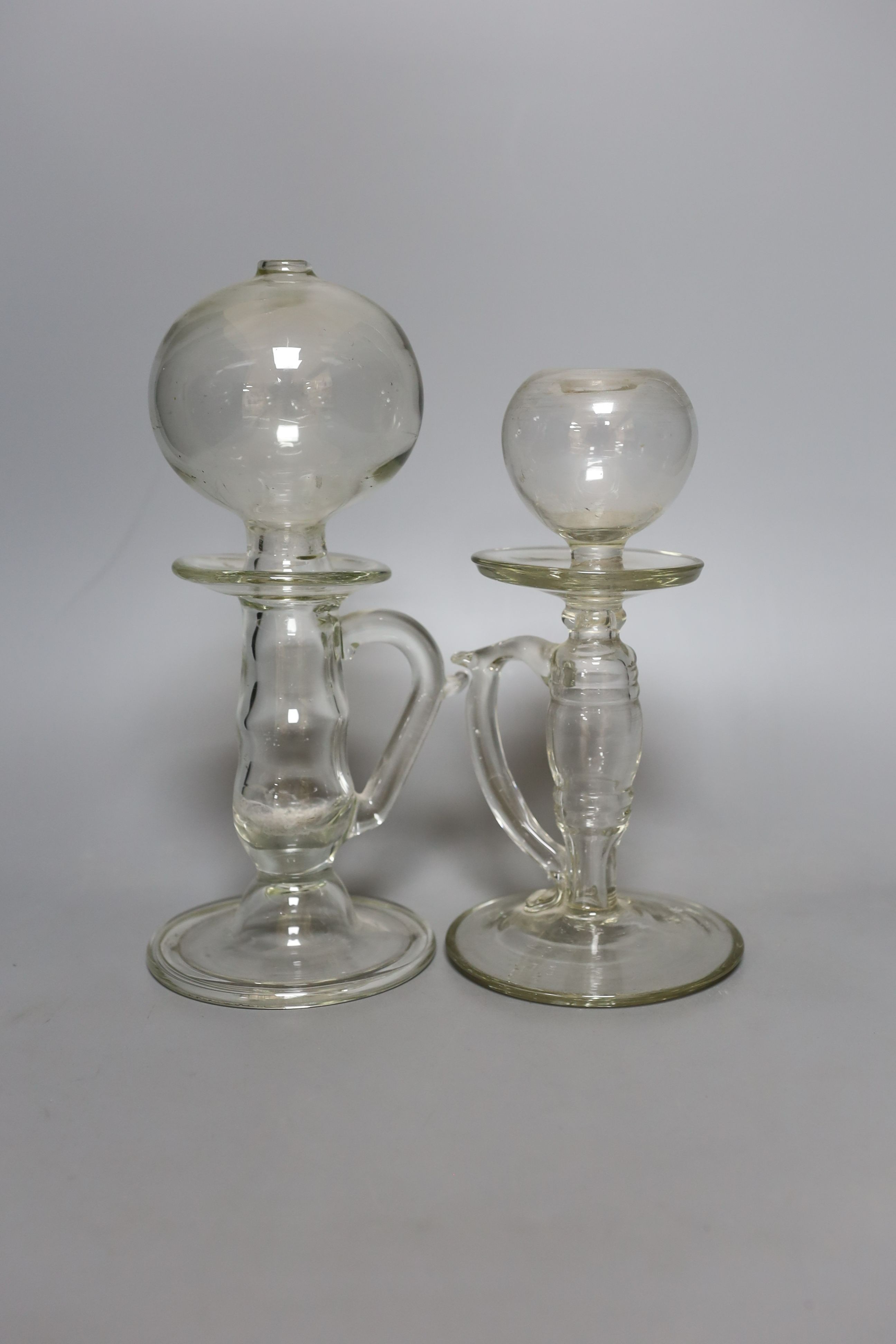 Two 19th century glass lacemaker's lamps - tallest 26cm